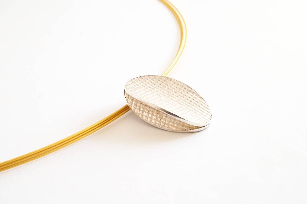 Silver oval linen textured pendant on spiral choker - Image 3